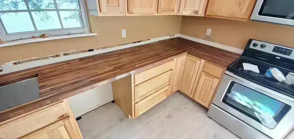 Hickory kitchen with butcher block counters by BNB Concepts