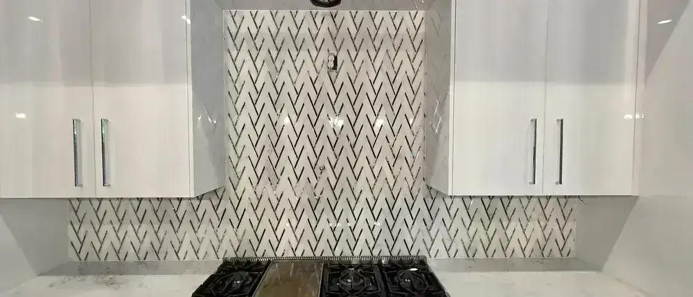 Herringbone Marble Backsplash by BNB Concepts