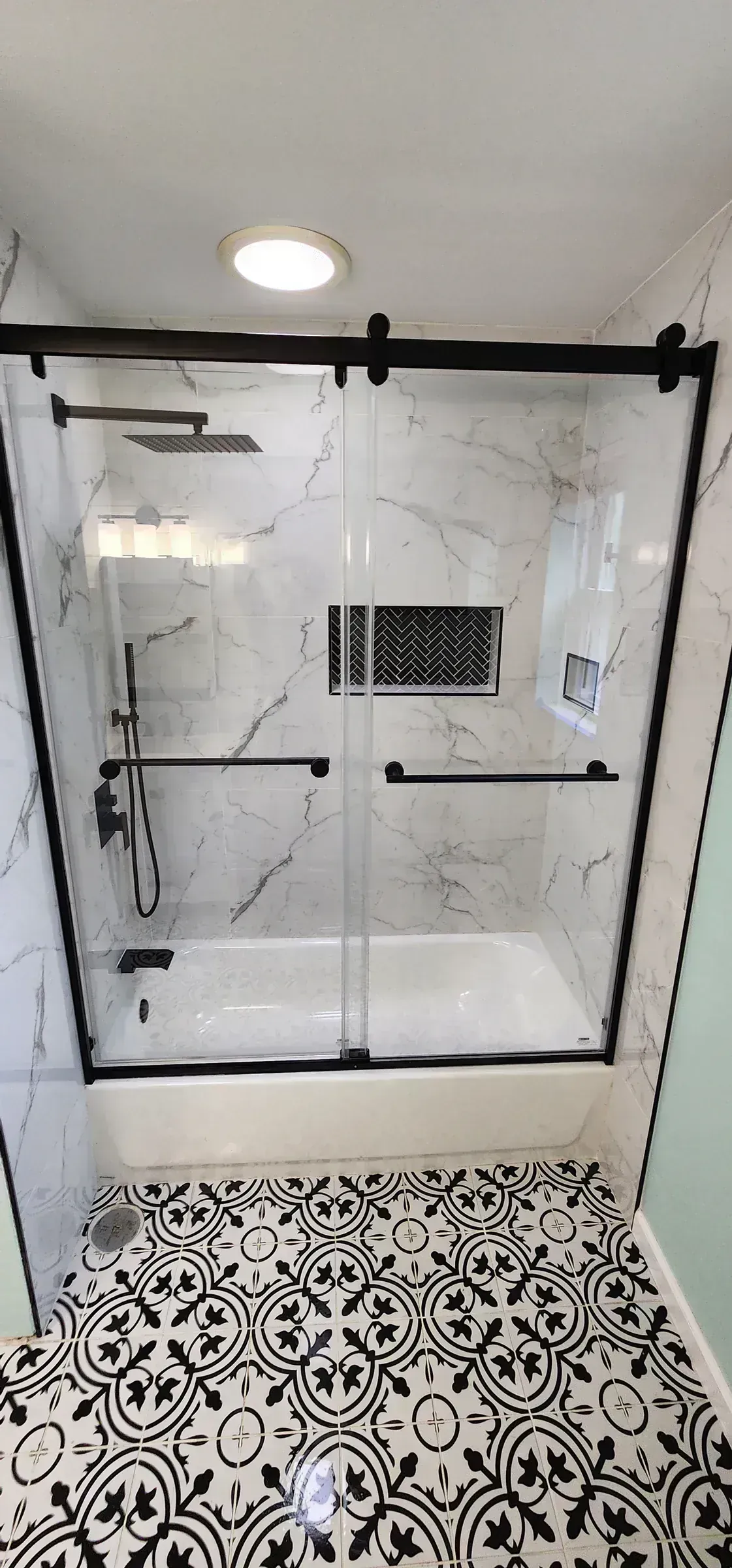Marble Shower with Glass Surround by BNB Concepts