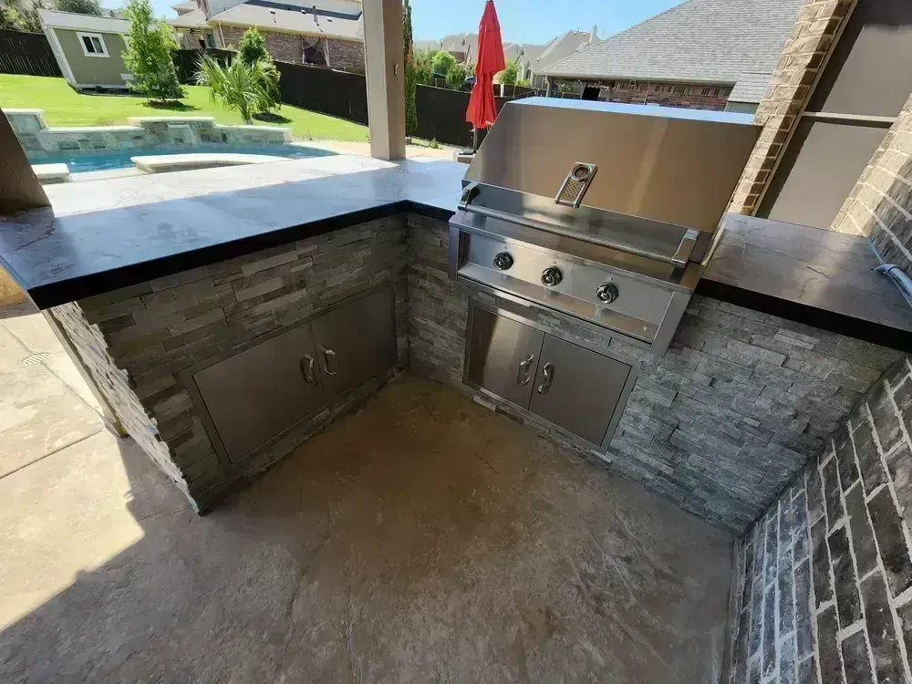 Outdoor Kitchen and Stone Counters by BNB Concepts