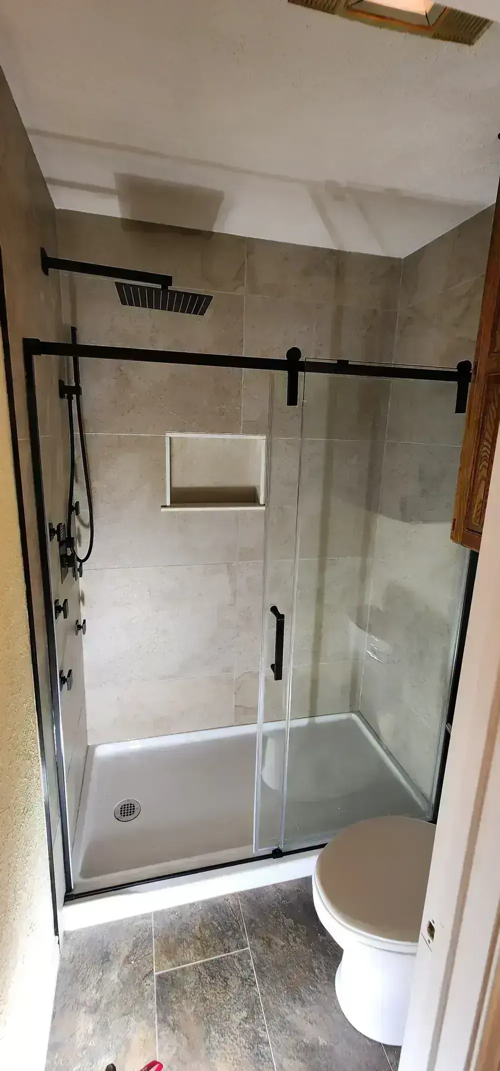 Tiled Shower and Glass Door by BNB Concepts