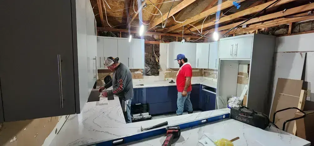 Two BNB Concepts crew members working a kitchen remodel